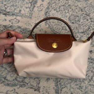Longchamp Mini Top-Handle Pouch in Cream with Brown Trim